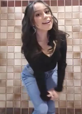 girl is teasing at the schools toilet
