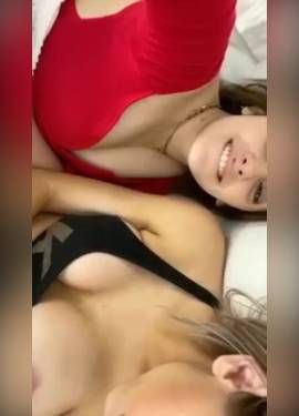 girl sucking on friends titties