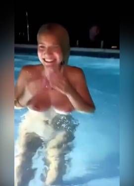 unhinged teen jumps into pool topless
